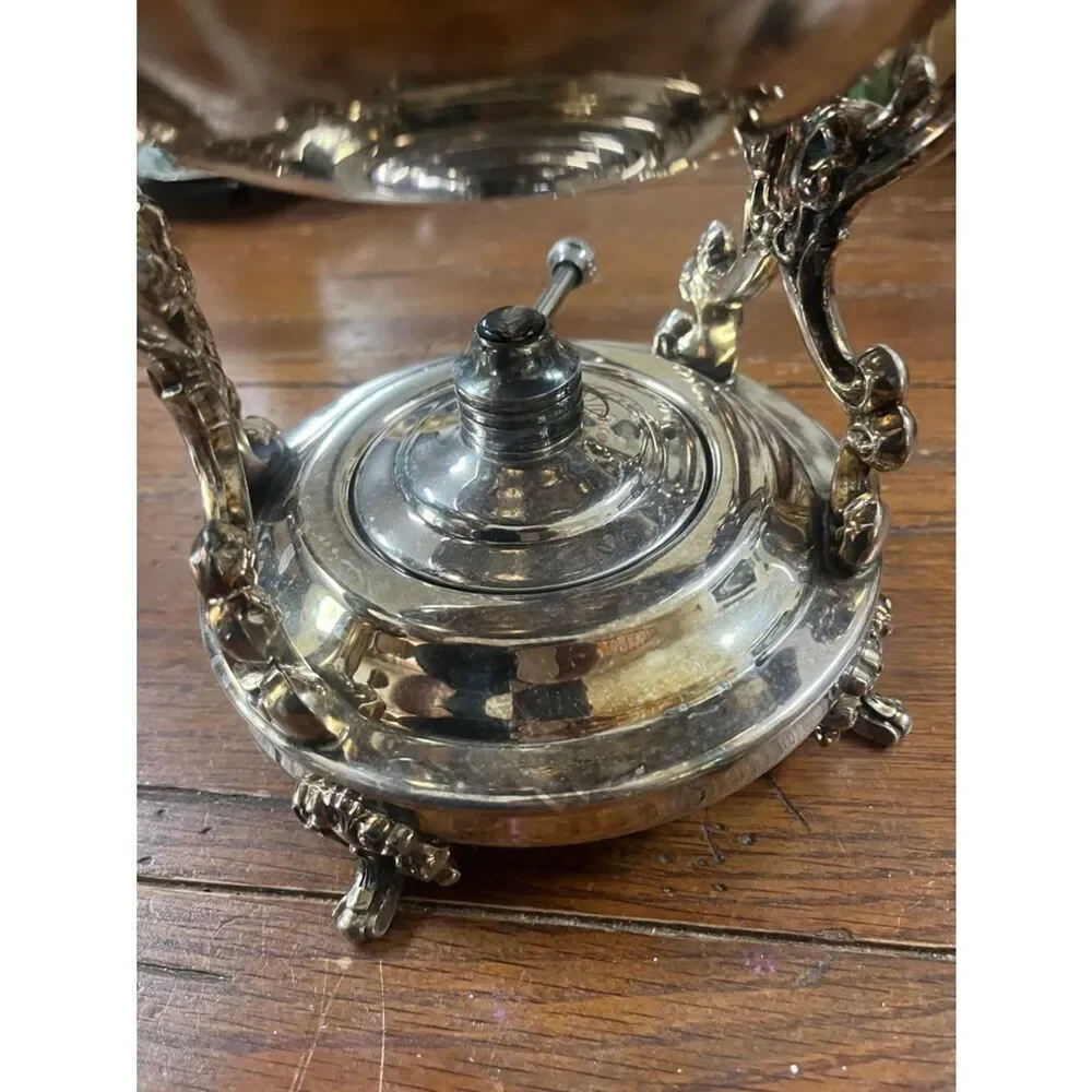 Towle tilting teapot